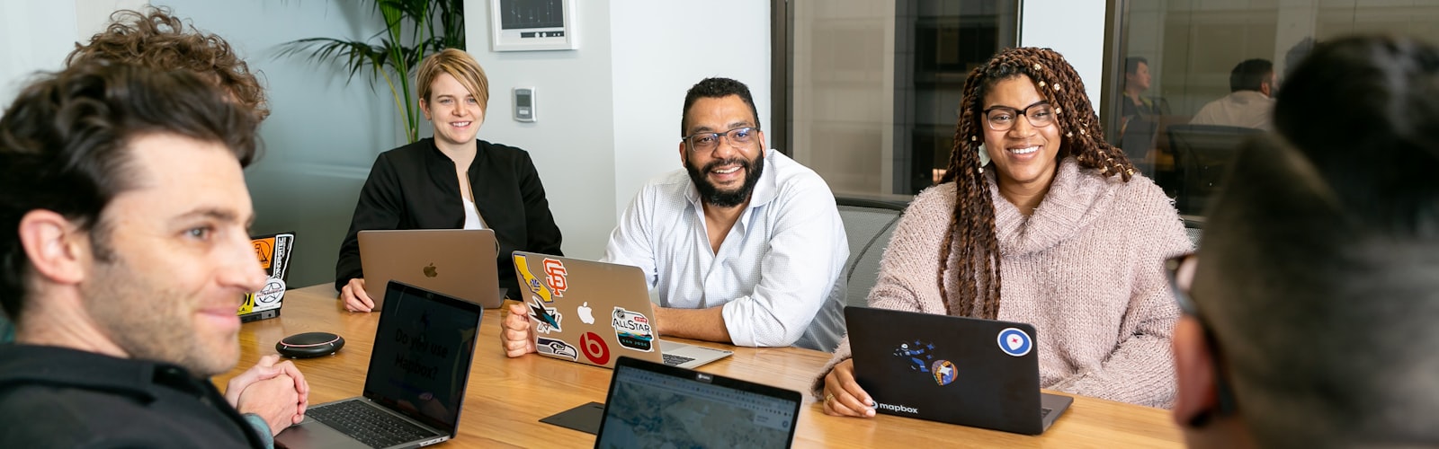 A diverse team of business professionals collaborating in a meeting